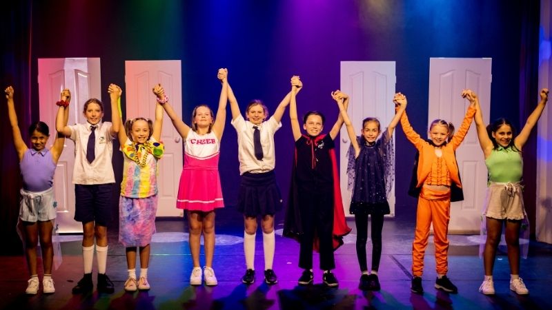 Kids taking a bow after performing arts classes at Evoke Performing Arts Academy Palmyra Perth
