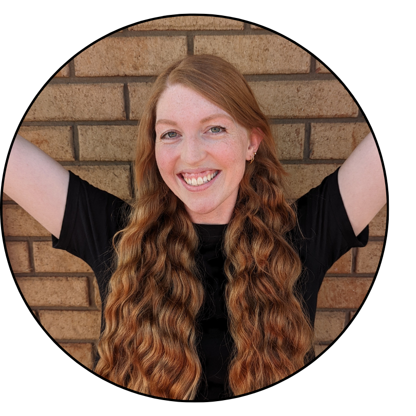 Kate, Evoke's owner and director smiling in welcome to all for evoke performing arts classes.